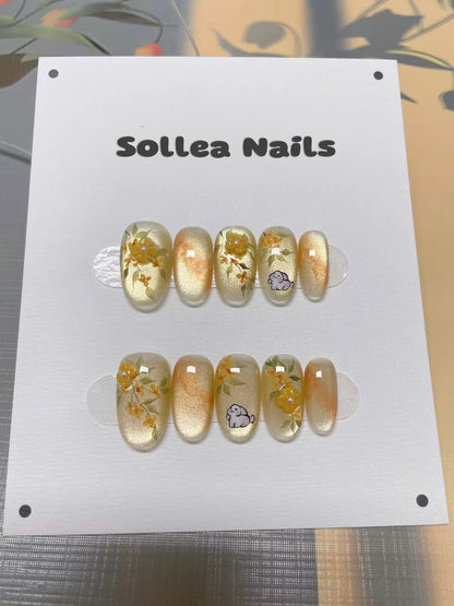 Golden Floral Bunny Nails