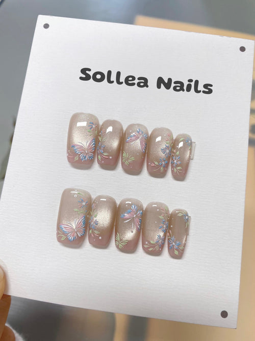 Nude Pastel Butterflies Nails